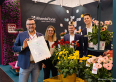 Het trotse team met de prijs