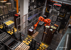 Robots die kratten stapelen