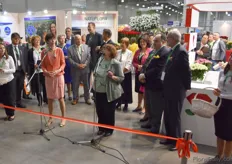 Official opening of the exhibition included a ribbon and scissors and a speech.