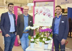 Marco, Joop and Niels from Floricultura standing next to some of their beautiful orchids.