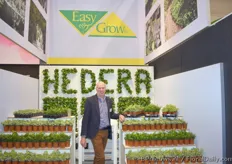J. van Eggermond from Easy Grow standing in the middle of his Hedera's.