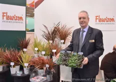 Frank de Greef of Fleurizon holding the Ranunculus. In the back the Phormium that attracted the attention of many of the visitors.
