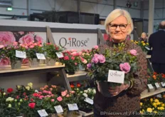 Helle Graff of Graff Kristensen holding the Q-iRose of Q-genetics, a new breeder of miniature roses.