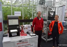 Francois Paradis and Sandra Sobral with Opto Machines. The seed selection machine in the back was invented 30 years ago, but is, with some improvements added, used to this day