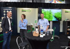 Willem van Dok with Seed Processing Holland, with on the left Melanie Klein greating a visitor to the booth.