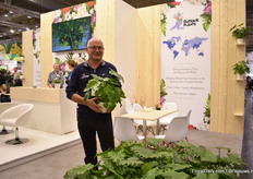 Mark Lunghusen of Outbreak Plants holding Philodendron Shangr-La, a variety of one of their Australian breeders they work with, namely Terry Keogh. "It is a more compact plant with many more stems."