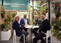 Reginald Deroose of Deroose Plants talking with visitors.