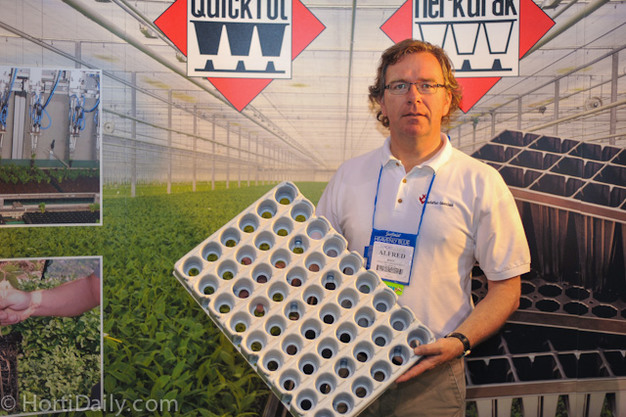 Alfred Boot from HerkuPlast holding a new propagation tray for hydroponic lettuce production.
